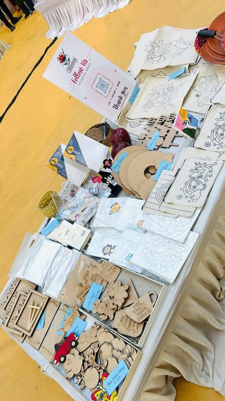 A joyful moment captured at the Blooming Creativity art stall