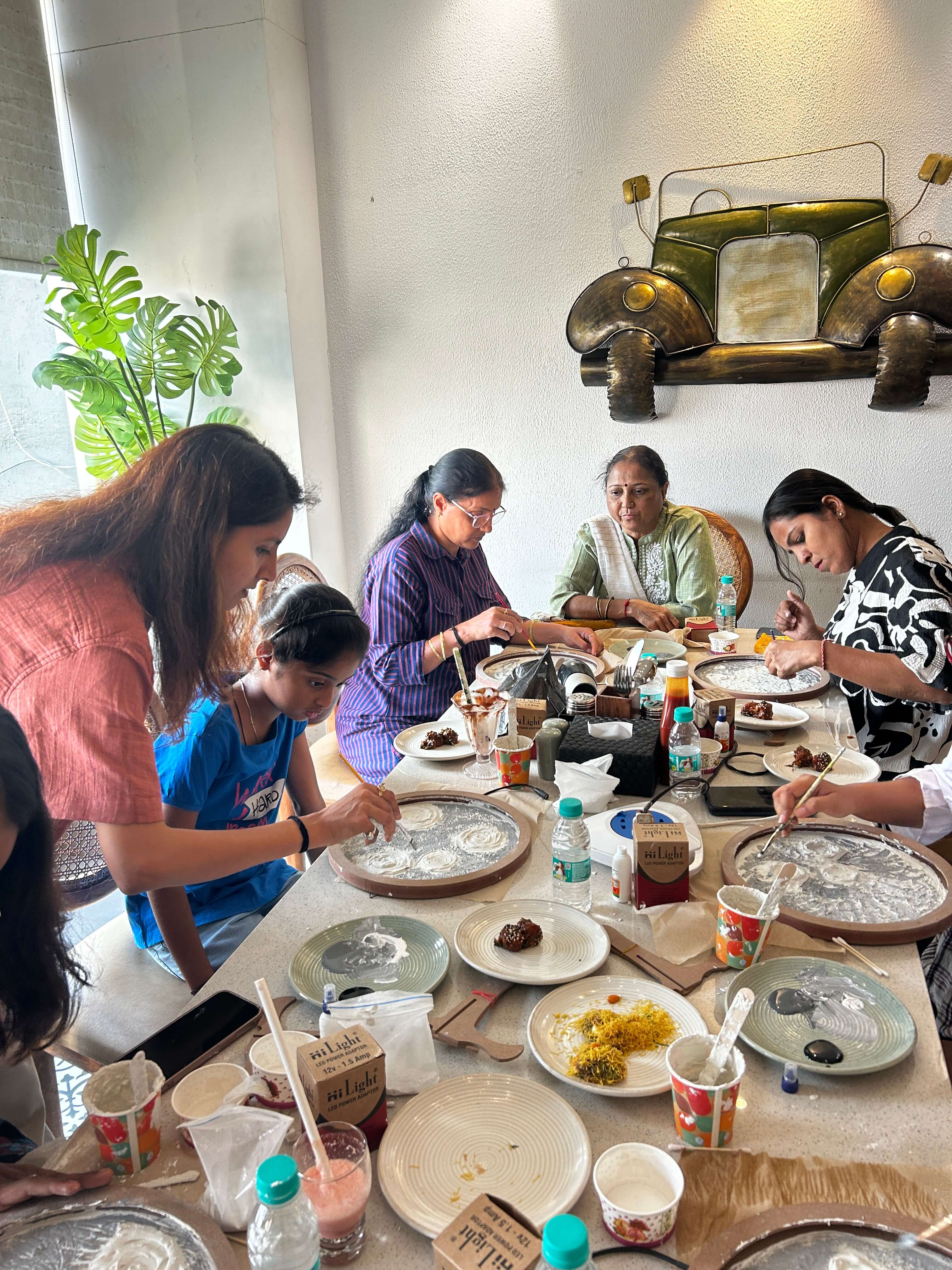 A beautiful handmade moon lamp glowing warmly on a stand