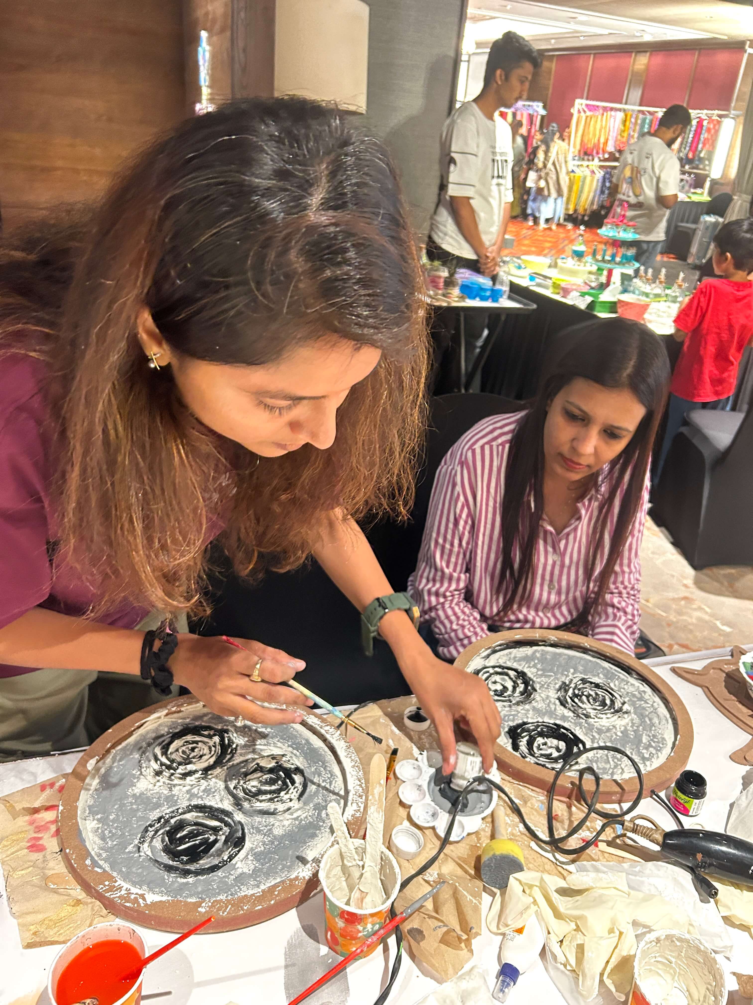 A glowing, handcrafted moon lamp created at a DIY event