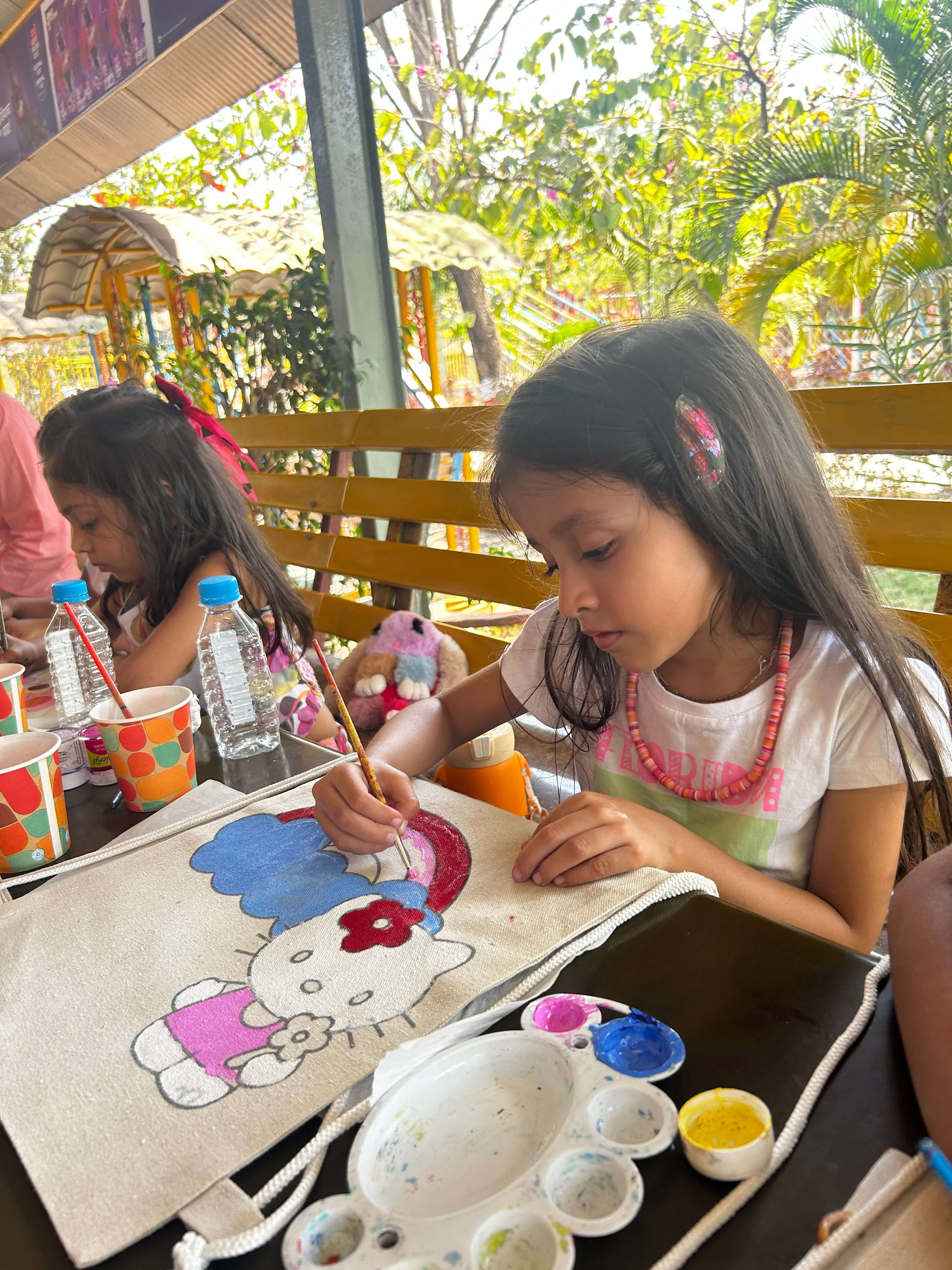 A personalized string bag with a unique painted design